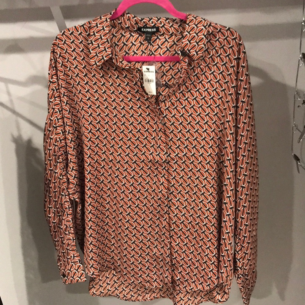 Express blouse button down, only worn once. Excellent condition. Runs large.